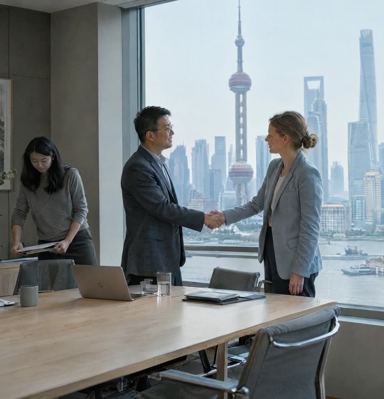 A meeting ending in a Shanghai office overlooking Lujiazui