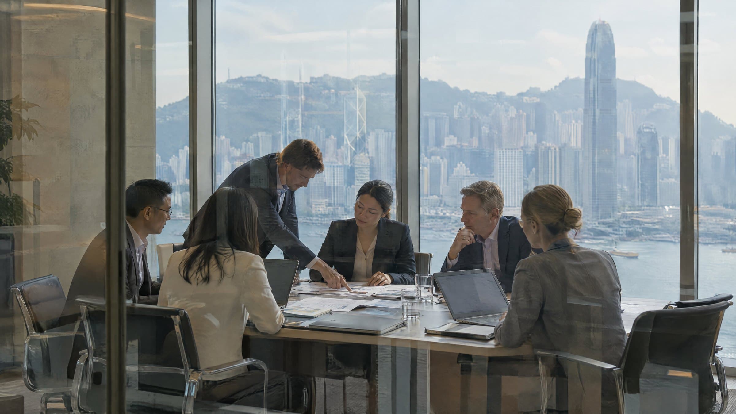 Two teams working together in a Hong Kong meeting room